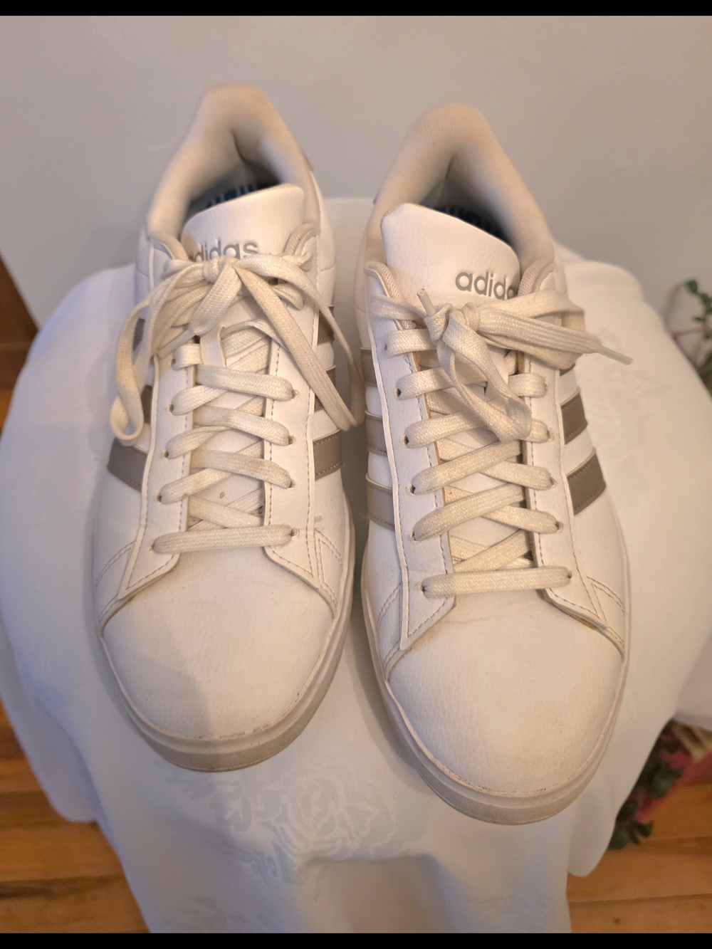 adidas White Sneakers with Gold Stripes